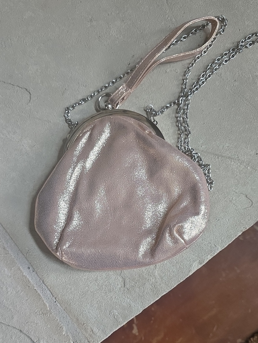 Gunne Sax by Jessica Mc Clinktok rose gold metallic pouch-style purse.
